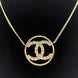 Chanel Gold Tone CC Circle Pendant Necklace