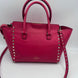 Valentino Garavani VALENTINO GARAVANI Rockstud Medium Pink Handbag