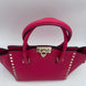 Valentino Garavani VALENTINO GARAVANI Rockstud Medium Pink Handbag