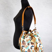 Dooney & Bourke Disney Medium Moana Coated Cotton Bucket Crossbody Bag Purse