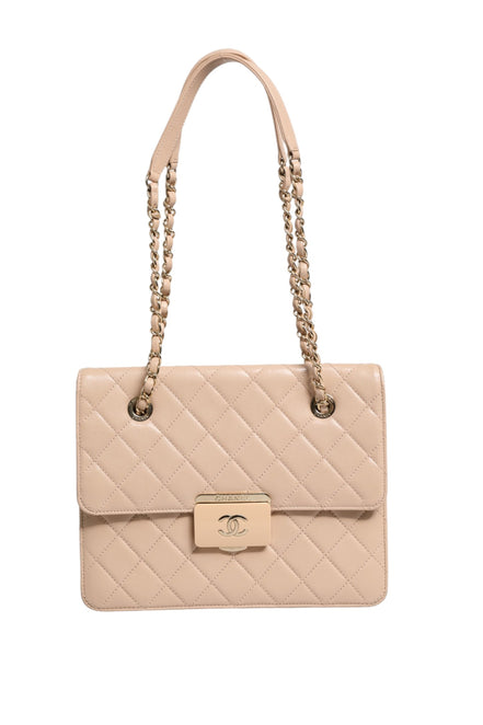 Chanel Quilted Leather Beauty Lock Flap Bag