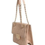 Chanel Quilted Leather Beauty Lock Flap Bag