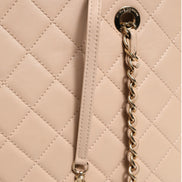 Chanel Quilted Leather Beauty Lock Flap Bag