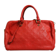Τσάντα Louis Vuitton Monogram Empreinte Speedy Bandouliere 30 σε κόκκινο