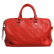 Τσάντα Louis Vuitton Monogram Empreinte Speedy Bandouliere 30 σε κόκκινο