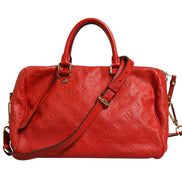 Τσάντα Louis Vuitton Monogram Empreinte Speedy Bandouliere 30 σε κόκκινο