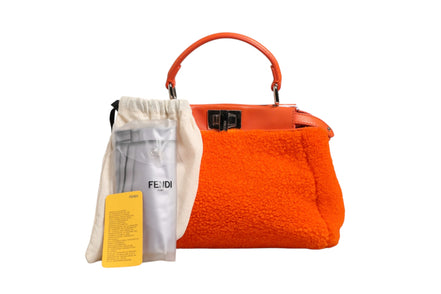 Μίνι τσάντα χειρός Peekaboo με πορτοκαλί δέρμα και shearling Fendi  