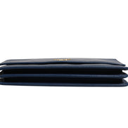 Πορτοφόλι clutch με αλυσίδα από μπλε δέρμα Saffiano Prada  