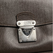 Louis Vuitton Belaia Clutch Taiga Leather