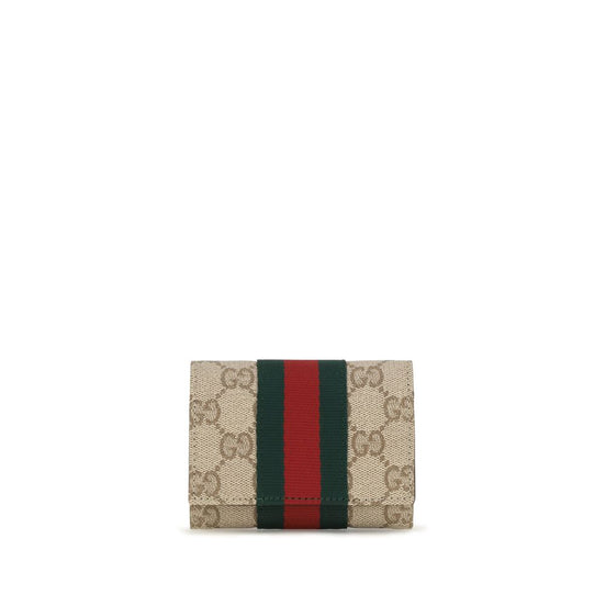 Μπεζ πορτοφόλι Gucci από βαμβάκι