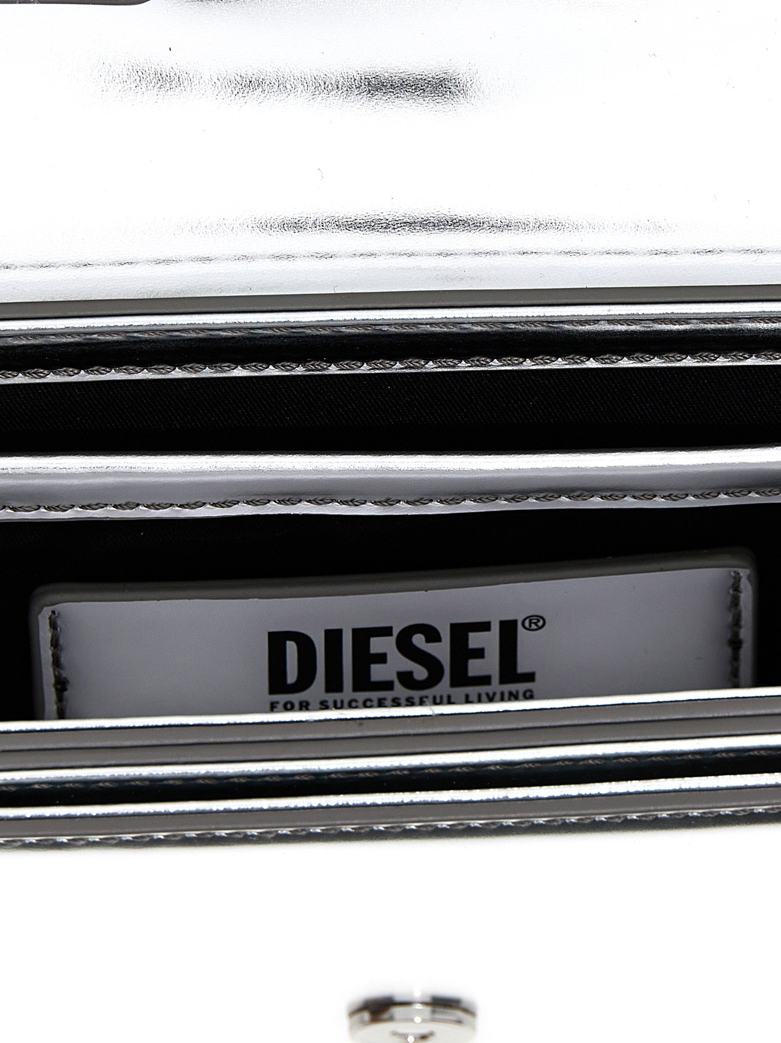 Ασημί τσάντα ώμου Diesel από δέρμα αγελάδας