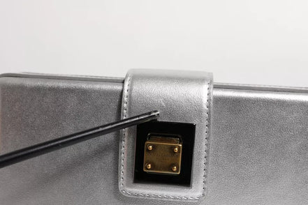Τσάντα Dolce & Gabbana μεταλλική ασημί DG BOX με δερμάτινο ιμάντα ώμου