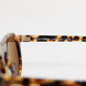 Dolce & Gabbana Καφέ Οβάλ Γυαλιά Ηλίου με Ταμπά Φύλλα Ασετάτ και Animal Print